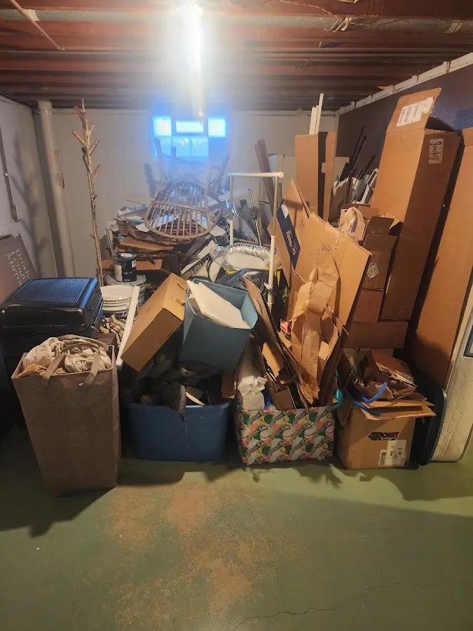 Roll-off dumpster container at job site for 8 Yard Dumpster Rental in Fernandina Beach